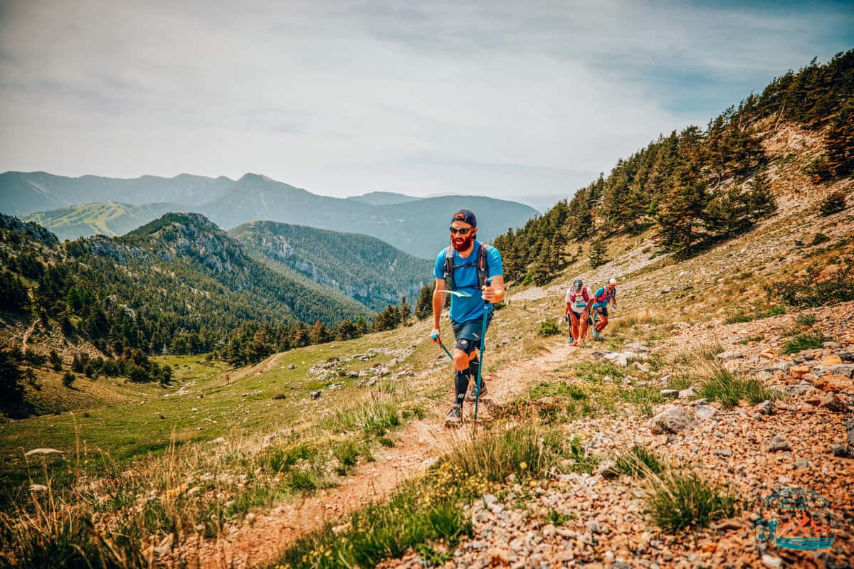 Jake climbing a steep slope at the Trails des Millefonts
